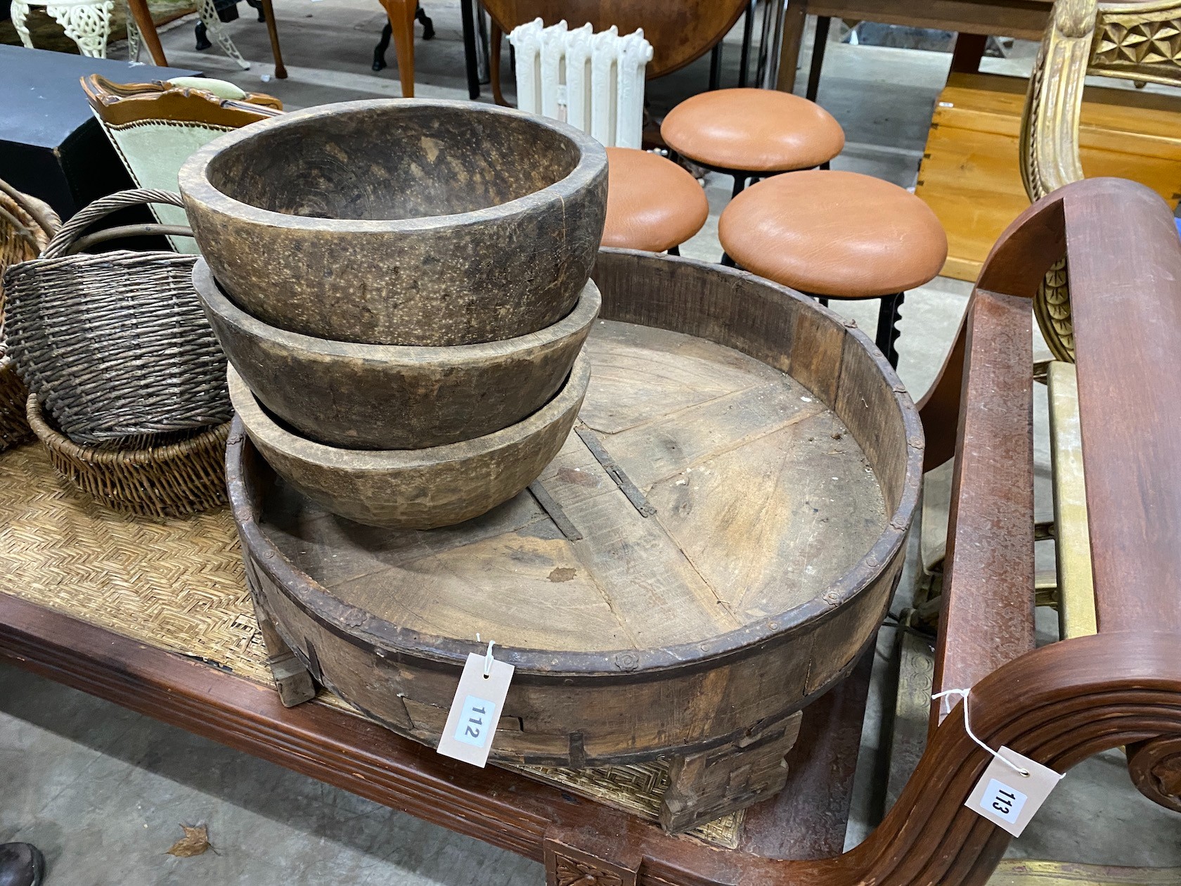 Four assorted wood mazers, largest diameter 68cm